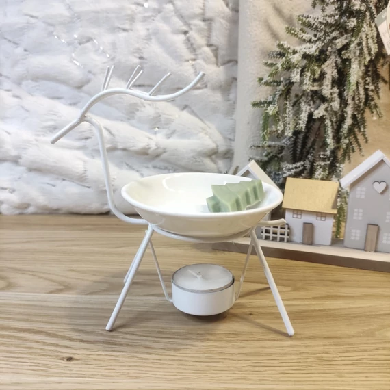 A kép csak illusztráció. A dekorációs elemek nem tartozékai a párologtatónak.